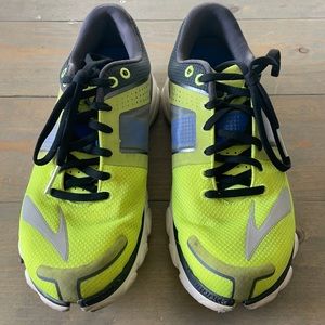 Neon yellow, black, and gray Brooks pureflow